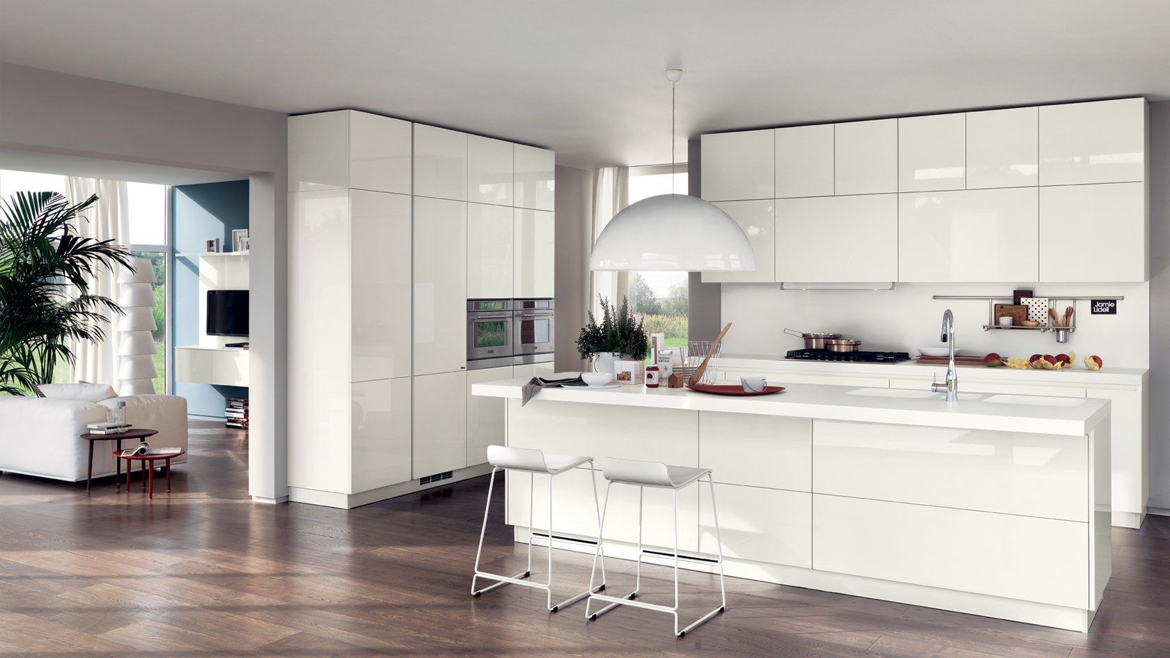 Moderna cucina bianca con isola, elettrodomestici in acciaio inossidabile e apertura sulla zona giorno.