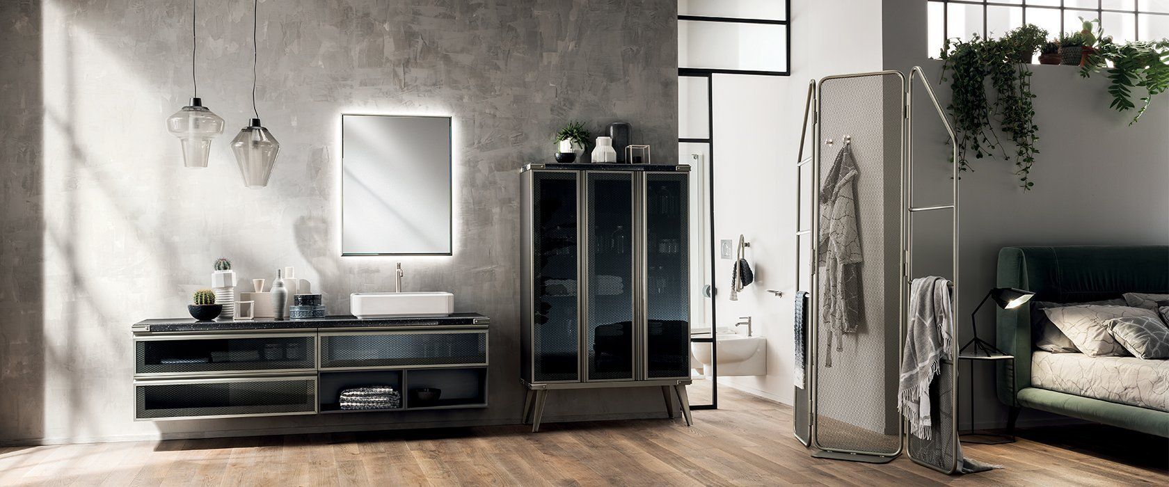 Bagno moderno con lavabo, mobile contenitore e letto. Pareti e decorazioni grigie.