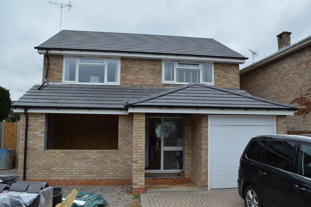 After: The house is extended to the front