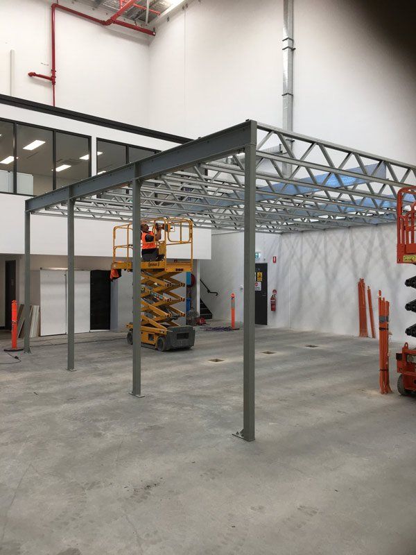 lift underneath metal structure