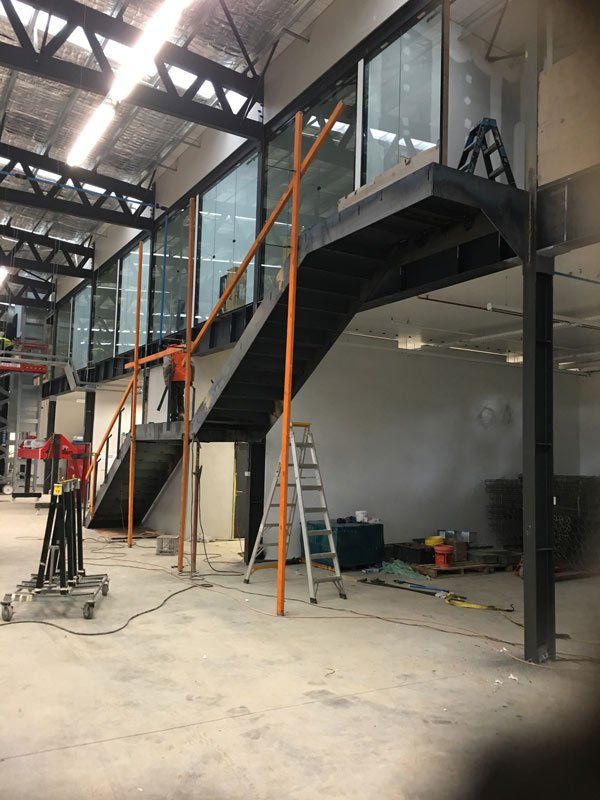 ladder underneath stairs
