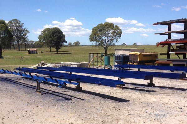 steel being painted blue