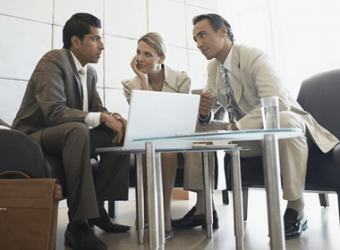 Financial advisor meeting with clients