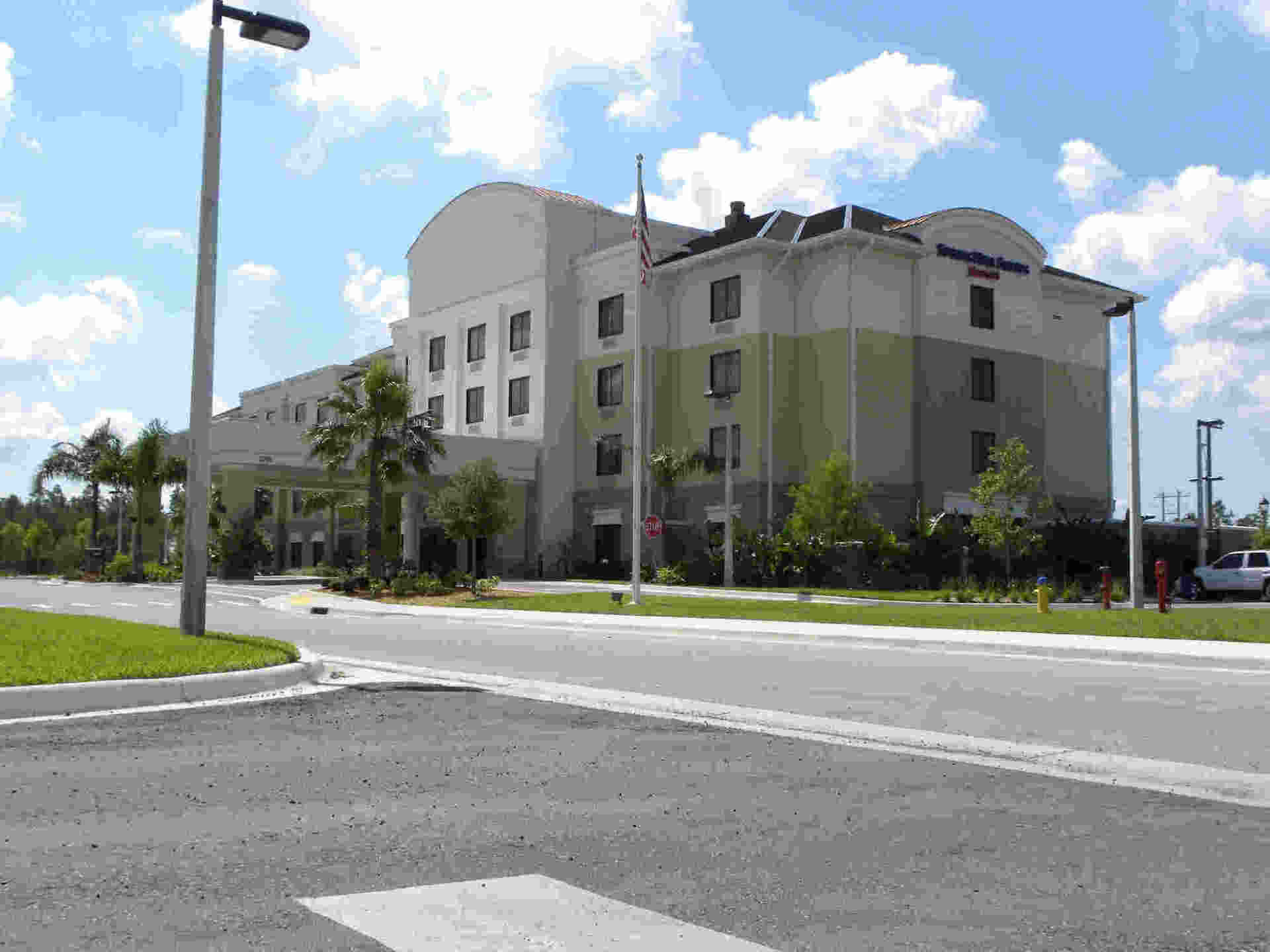 Highway White Colored Building — Closers in Brandon, FL