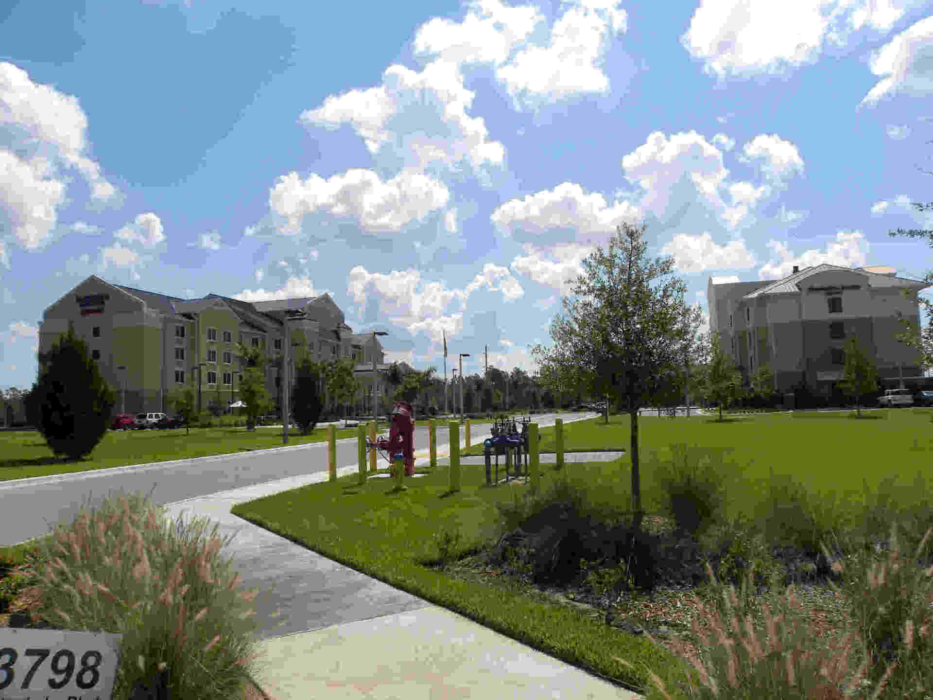Garden with Commercial Buildings — Closers in Brandon, FL