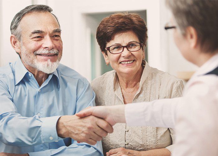 Law Firm — Senior Couple Meeting Lawyer In Rockville, MD
