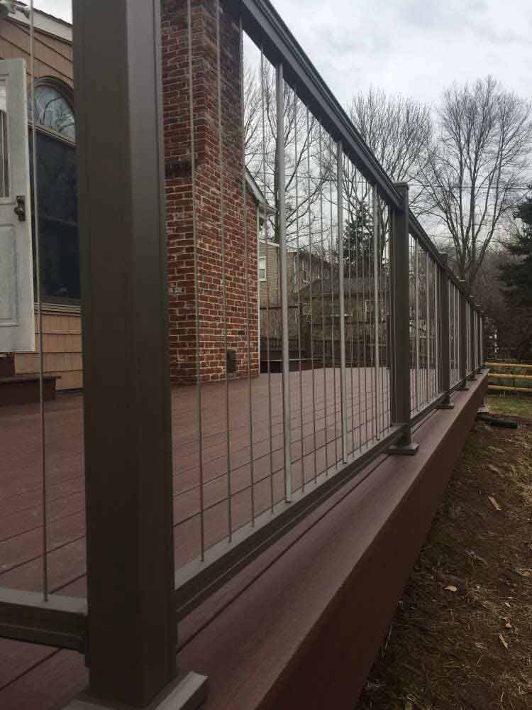 This Is An Azek Deck With Plugs Covering All Screws For A Smooth Deck Surface And An Aluminum Key Link - Decking Services in Wyncote, PA