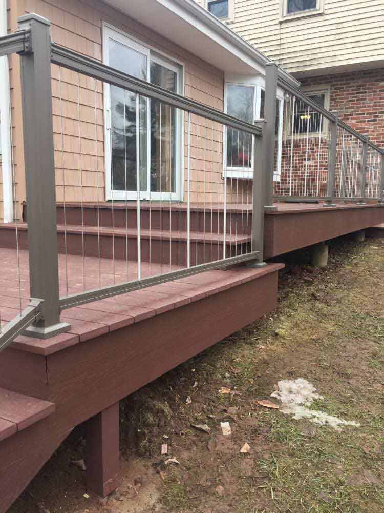 This Is An Azek Deck With Plugs Covering All Screws For A Smooth Deck Surface And An Aluminum Key Link - Decking Services in Wyncote, PA