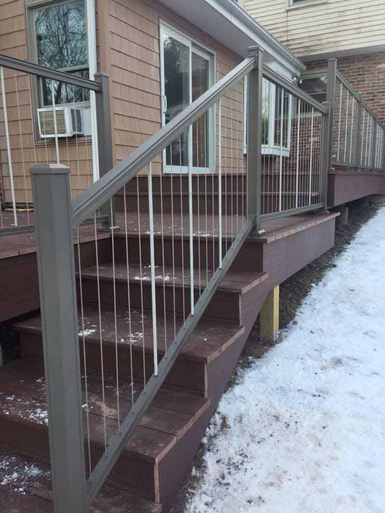 This Is An Azek Deck With Plugs Covering All Screws For A Smooth Deck Surface And An Aluminum Key Link - Decking Services in Wyncote, PA