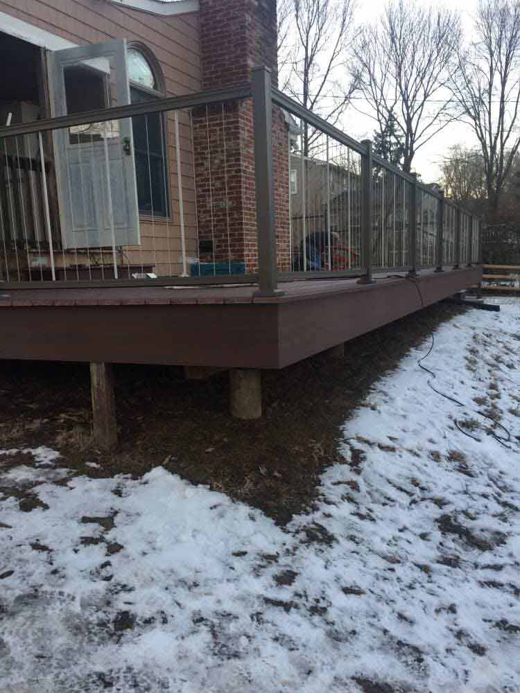 This Is An Azek Deck With Plugs Covering All Screws For A Smooth Deck Surface And An Aluminum Key Link - Decking Services in Wyncote, PA