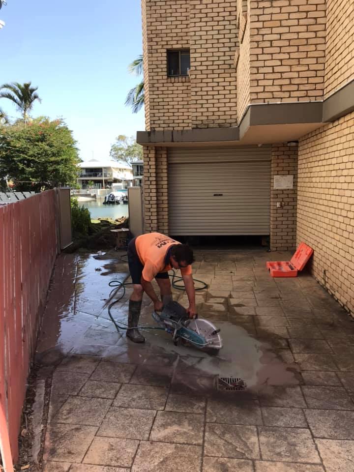 Cutting Concrete for Burst Pipe — F & M Plumbers & Drainers In Kunda Park QLD Cutting Concrete for Burst Pipe — F & M Plumbers & Drainers In Kunda Park QLD