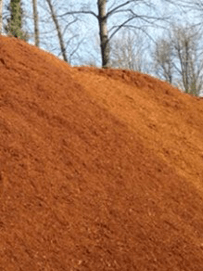 Red Soil — Top-Quality Hemlock & Red Fir Barkdust In Milwaukie, OR Red Soil — Top-Quality Hemlock & Red Fir Barkdust In Milwaukie, OR