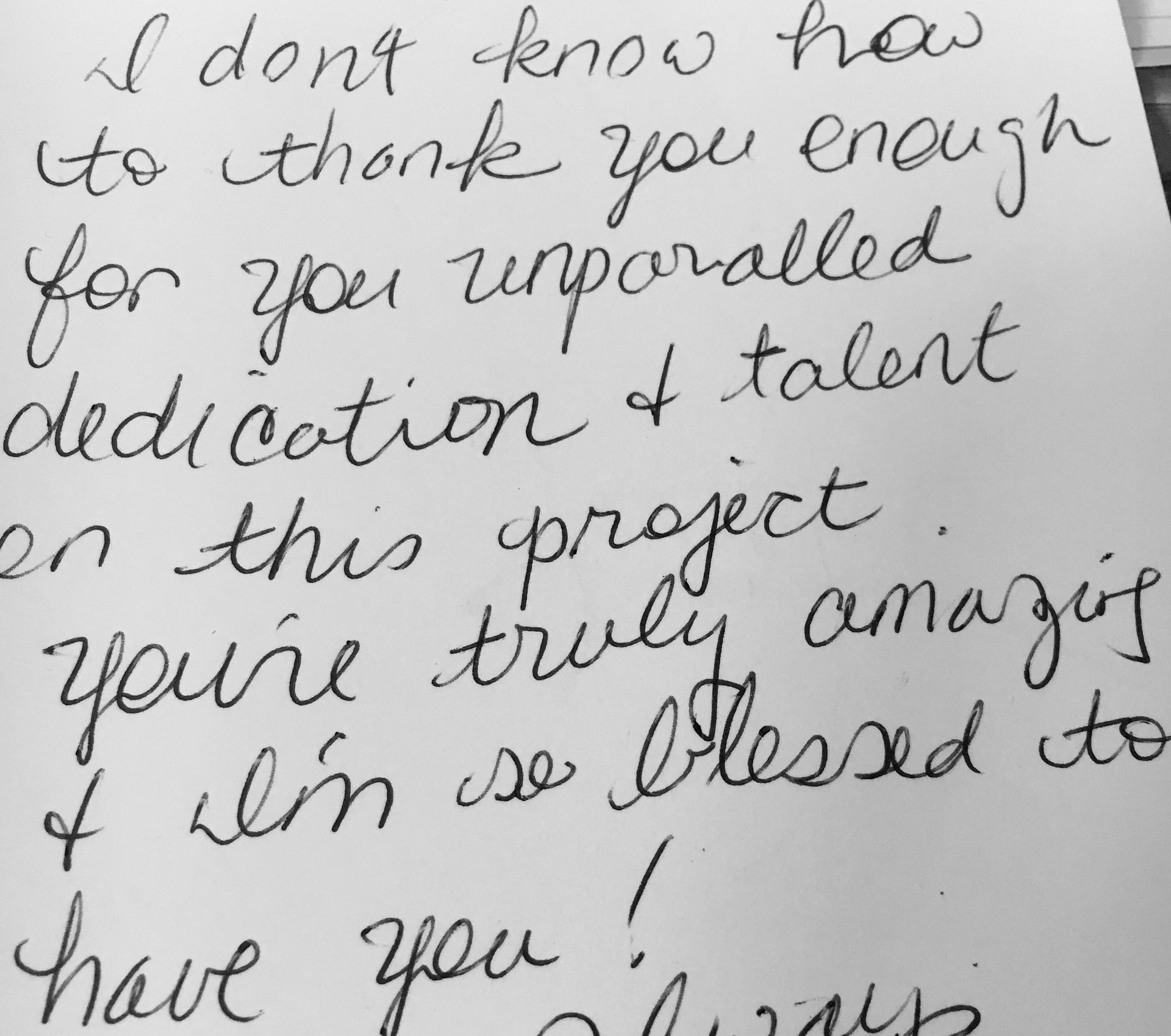 A handwritten note that says i don t know how to thank you enough for your unparalleled dedication & talent on this project