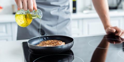 Man Cooking At Kitchen — Seguin, TX — A1 Tri-County Plumbing