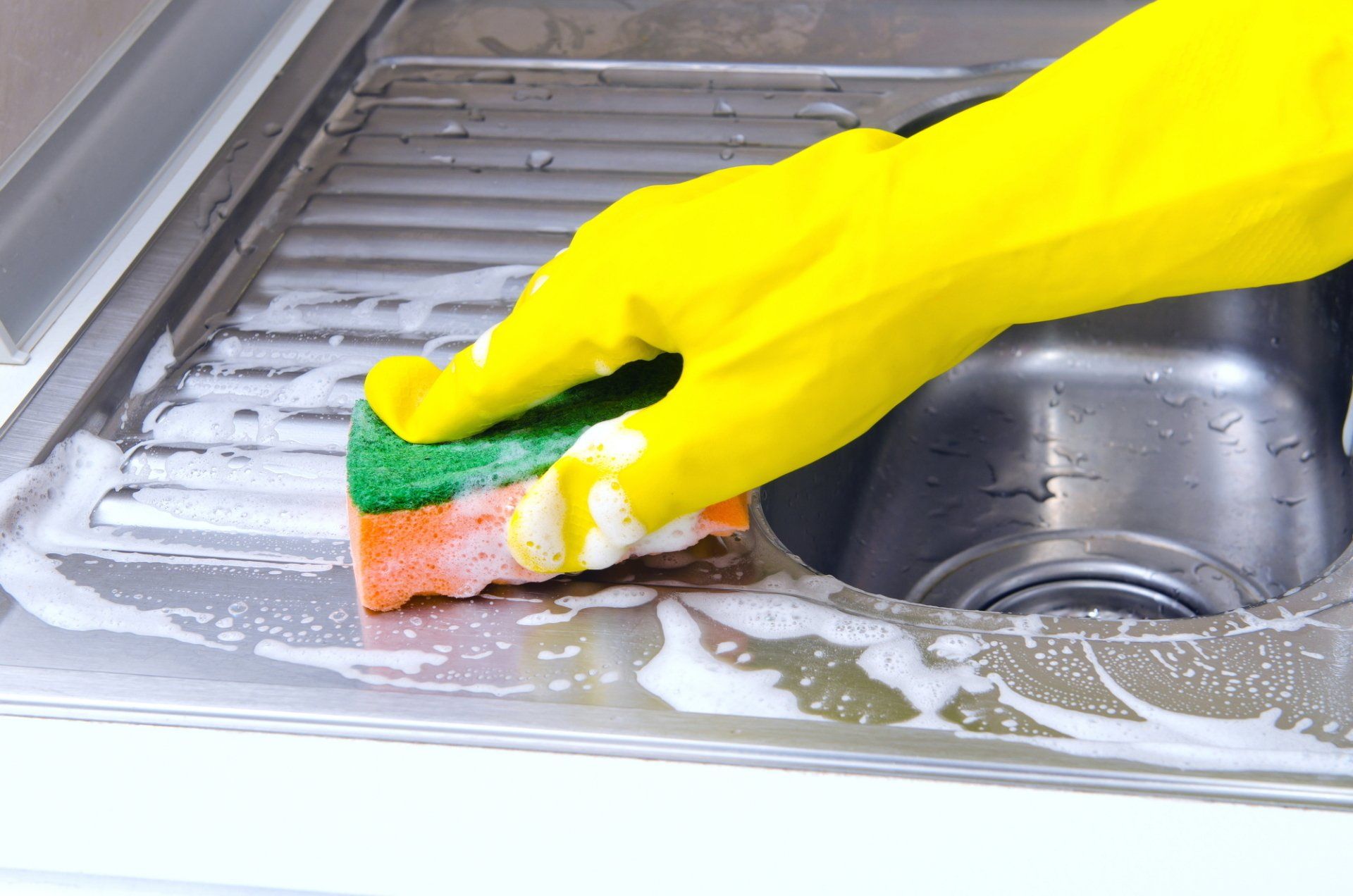 Scrub Cleaning The Sink — Seguin, TX — A1 Tri-County Plumbing Scrub Cleaning The Sink — Seguin, TX — A1 Tri-County Plumbing