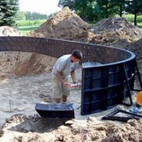 Installing Pool Foundation — Kalamazoo, MI — Mark’s Pool Services LLC Installing Pool Foundation — Kalamazoo, MI — Mark’s Pool Services LLC
