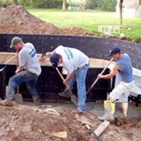 Men Adding Concrete — Kalamazoo, MI — Mark’s Pool Services LLC