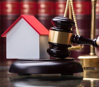 Gavel and House Model — Grandville attorney in Grandville, MI