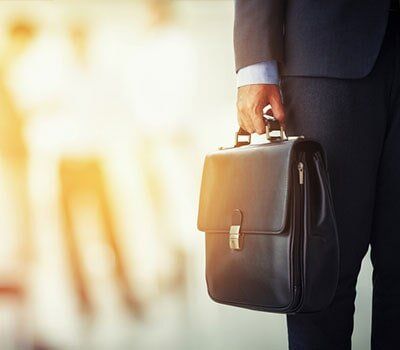 Attorney Holding His Briefcase — Grandville attorney in Grandville, MI Attorney Holding His Briefcase — Grandville attorney in Grandville, MI