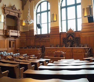 Court Setting with Wooden Chairs — Grandville attorney in Grandville, MI