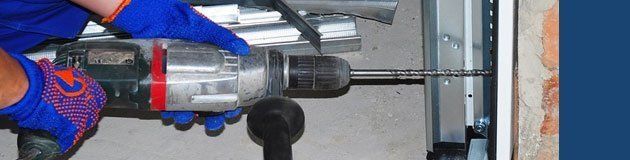 Garage Door Repairs — Drilling a Garage Door in Lomita, CA Garage Door Repairs — Drilling a Garage Door in Lomita, CA