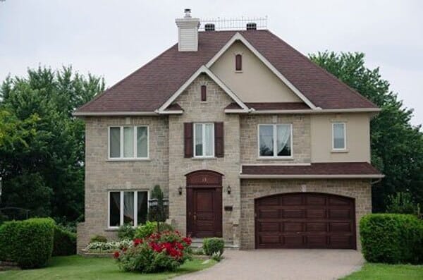Residential Garage Door Installations — New House with Brown Garage Door in Lomita, CA