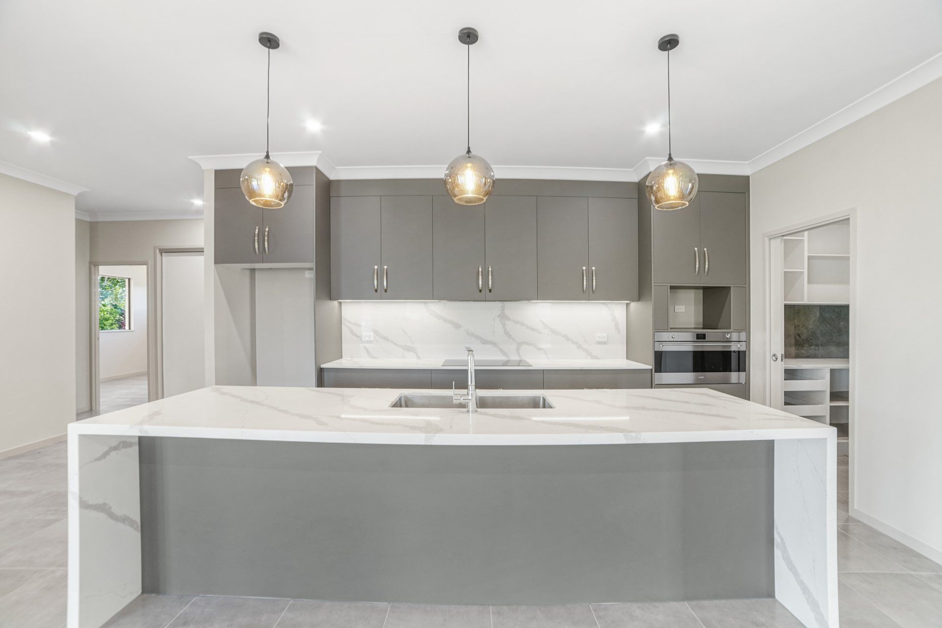 Grey And White Kitchen — Kitchen Design in Edmonton, QLD