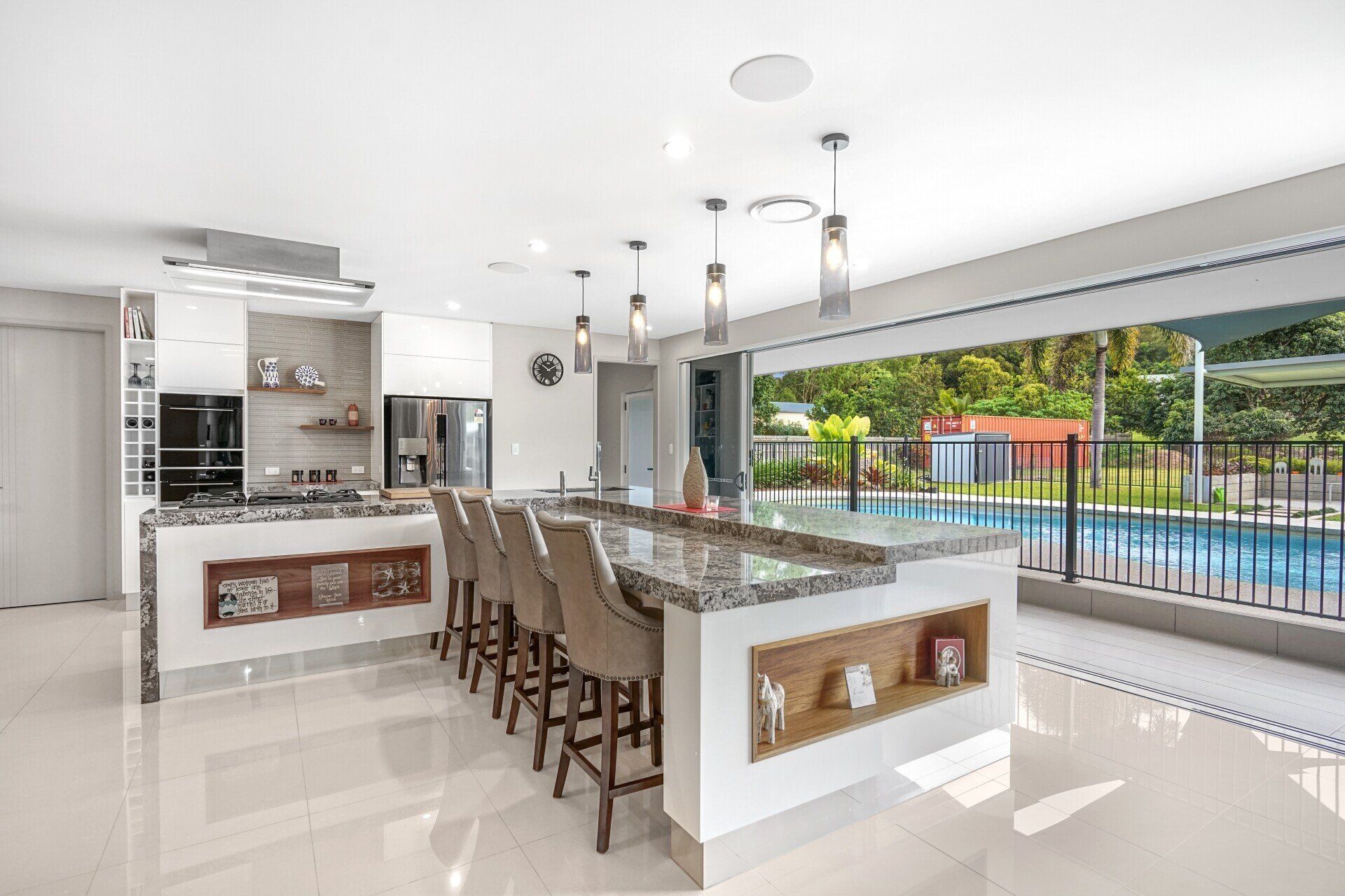 Outdoor Kitchen With Glossy Countertop — Kitchen Design in Edmonton, QLD