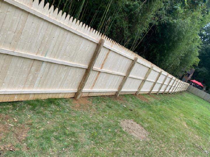 White Fence — Long Island, NY — Bamboo Removal and Landscaping Design in Long Island by Jose Benitez