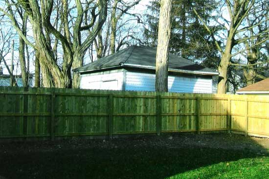 Fence Repairs — Finished Wooden Fence Repair in Grand Rapids, MI