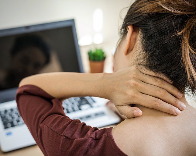 Woman Suffers from Neck Pain — Rose Hill, KS — Rose Hill Chiropractic Woman Suffers from Neck Pain — Rose Hill, KS — Rose Hill Chiropractic