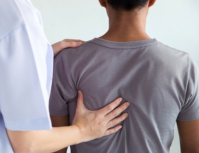 Man with Back Injury — Rose Hill, KS — Rose Hill Chiropractic