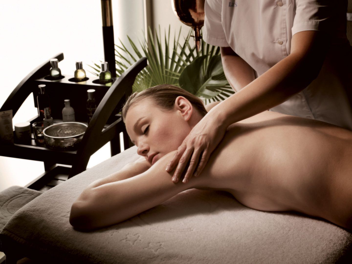 a woman getting a pampering massage