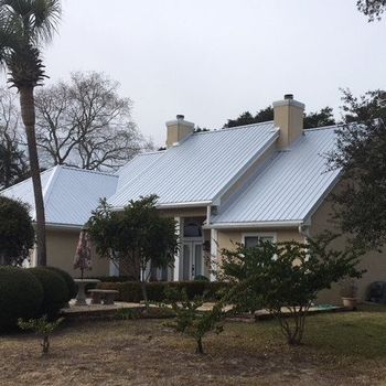 Roofing — Cropped Photo Of Roof With Blue Sky in Walton Beach, FL