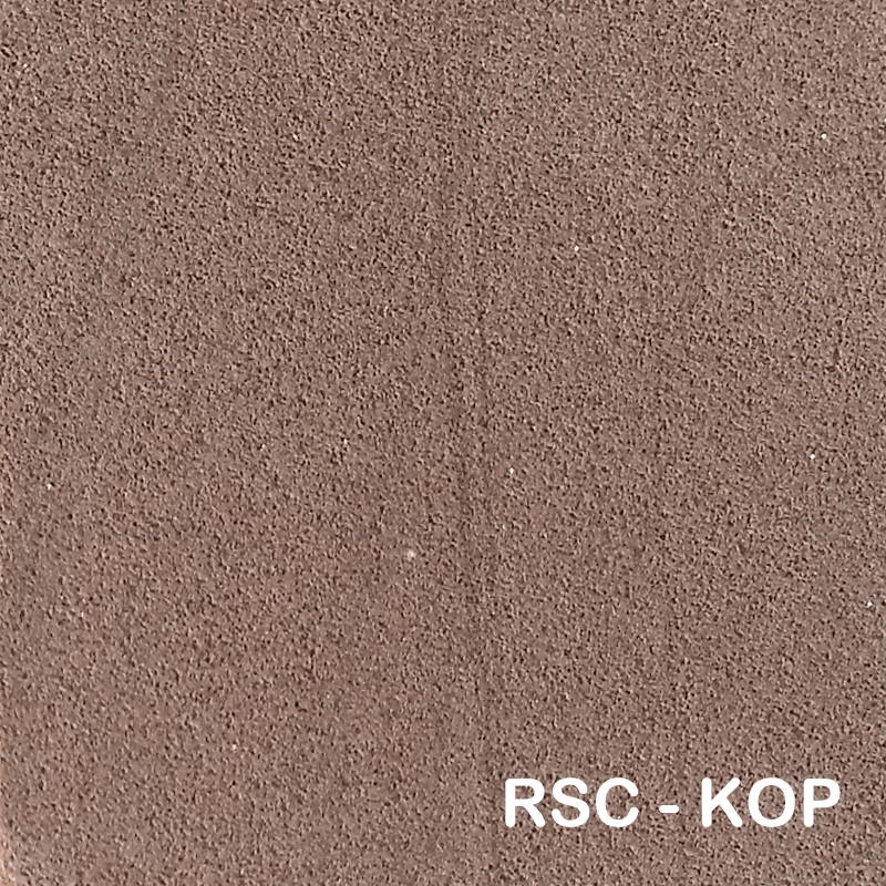 Brązowa, teksturowana powierzchnia z tekstem „RSC - KOP” w prawym dolnym rogu.