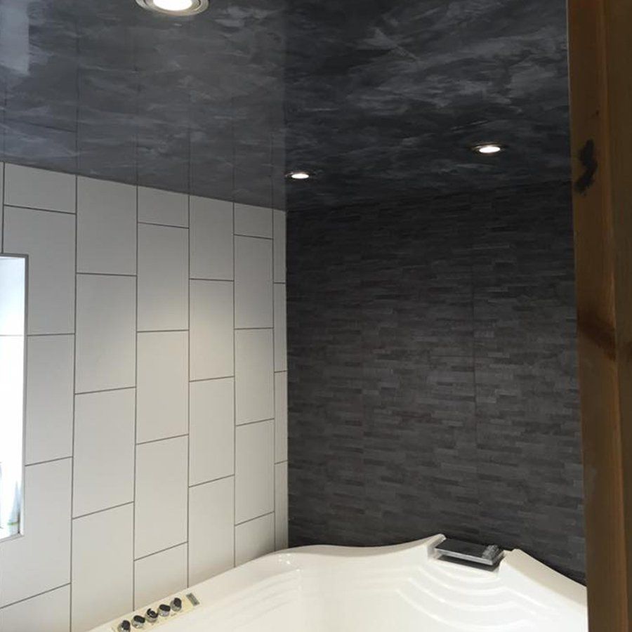 nice designed bathroom in black and white tile