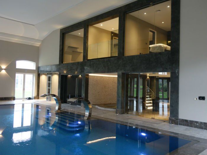 venetian plastery side view of an interior pool
