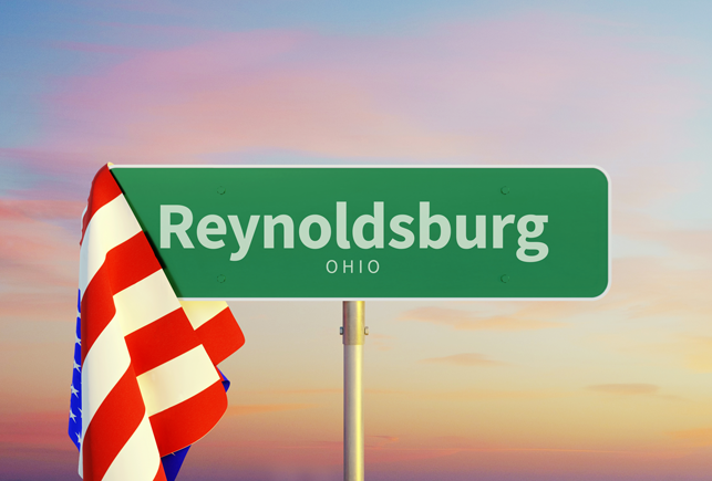 A green street sign for Reynoldsburg Ohio