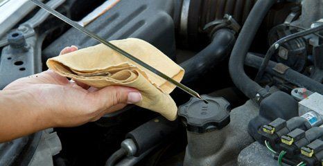 Checking oil on the dipstick
