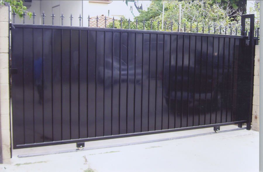 Contemporary Design Driveway Gate — Ste. K Santee, CA — Sam's Fencing Inc.