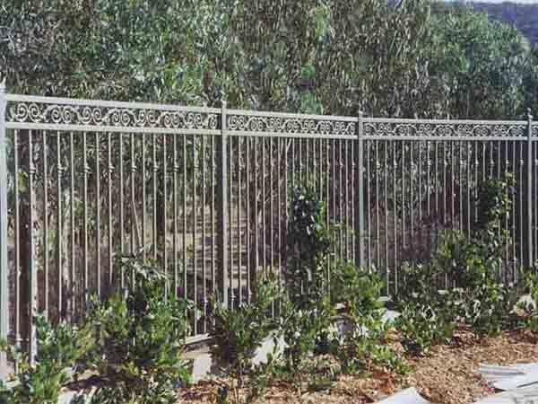 Fence with Plants — Ste. K Santee, CA — Sam's Fencing Inc.