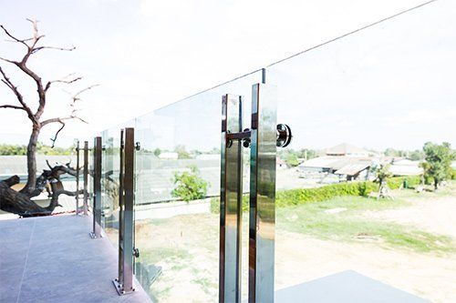 House With Glass Railing — Ste. K  Santee, CA — Sam's Fencing