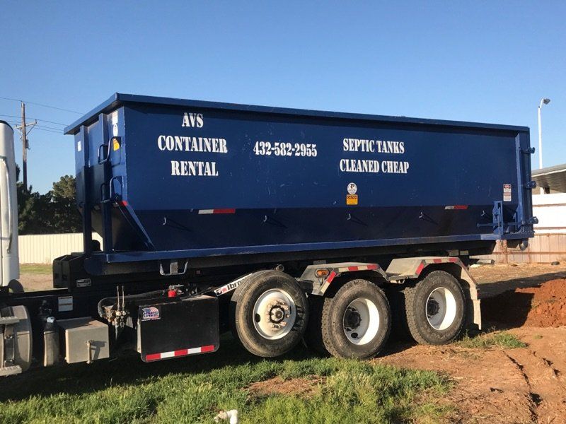 Roll-off dumpster in transit