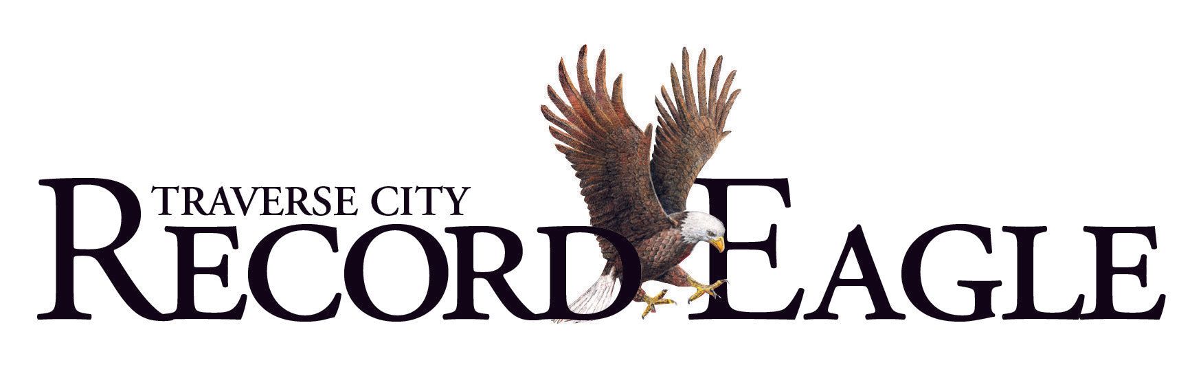 A logo for traverse city record eagle with an eagle on it