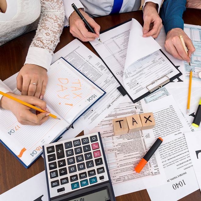 Using a Calculator on Tax Day — Birmingham, AL — All Tax Now LLC