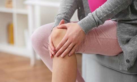 Woman Experiencing Joint Pain — Sunnyside, WA — Yakima Valley Chiropractic Center Woman Experiencing Joint Pain — Sunnyside, WA — Yakima Valley Chiropractic Center