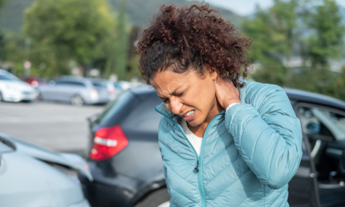 Woman Having A Neck Pain — Sunnyside, WA — Yakima Valley Chiropractic Center Woman Having A Neck Pain — Sunnyside, WA — Yakima Valley Chiropractic Center