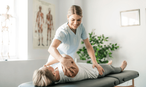 Chiropractor with Patient — Sunnyside, WA — Yakima Valley Chiropractic Center Chiropractor with Patient — Sunnyside, WA — Yakima Valley Chiropractic Center
