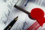 Client signing paper - Law services in Sterling Heights Client signing paper - Law services in Sterling Heights