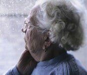 Senior citizen looking outside - Law services in Sterling Heights Senior citizen looking outside - Law services in Sterling Heights